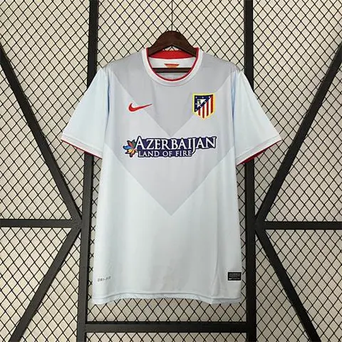 13-14 A MAD away jersey