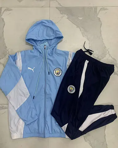 24-25 MCI Light Blue windbreaker suit