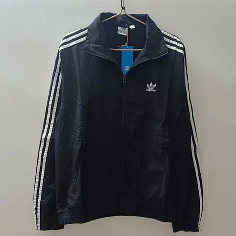 25-26 AD Black windbreaker