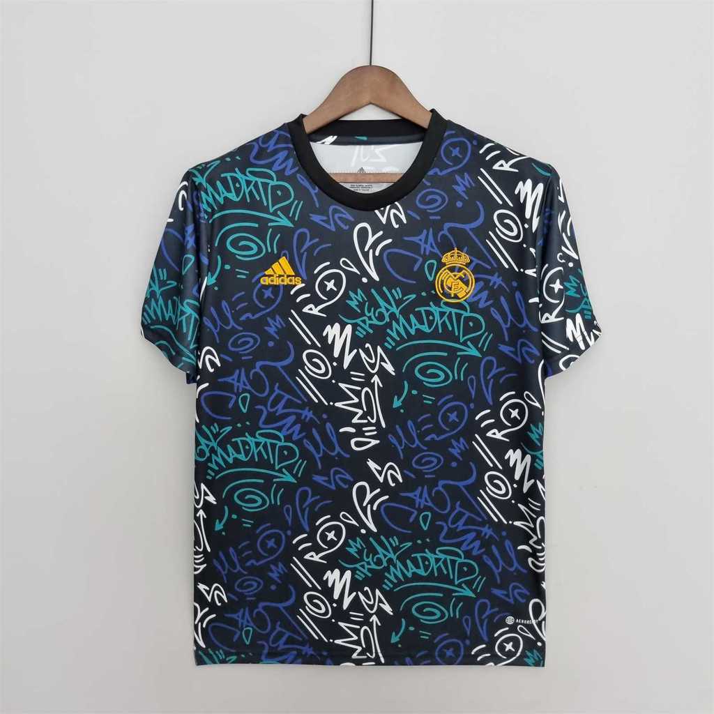 22-23 R MAD blue with green training shirt