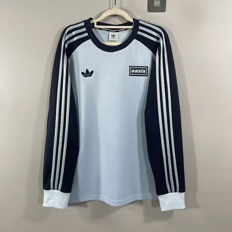 Maillot de football AD Oasis bleu ciel — 2025/26 · Manches longues · tailles S–3XL