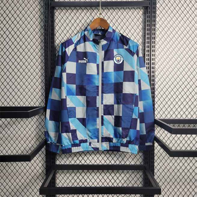 23-24 MCI blue with white and light blue Windbreaker