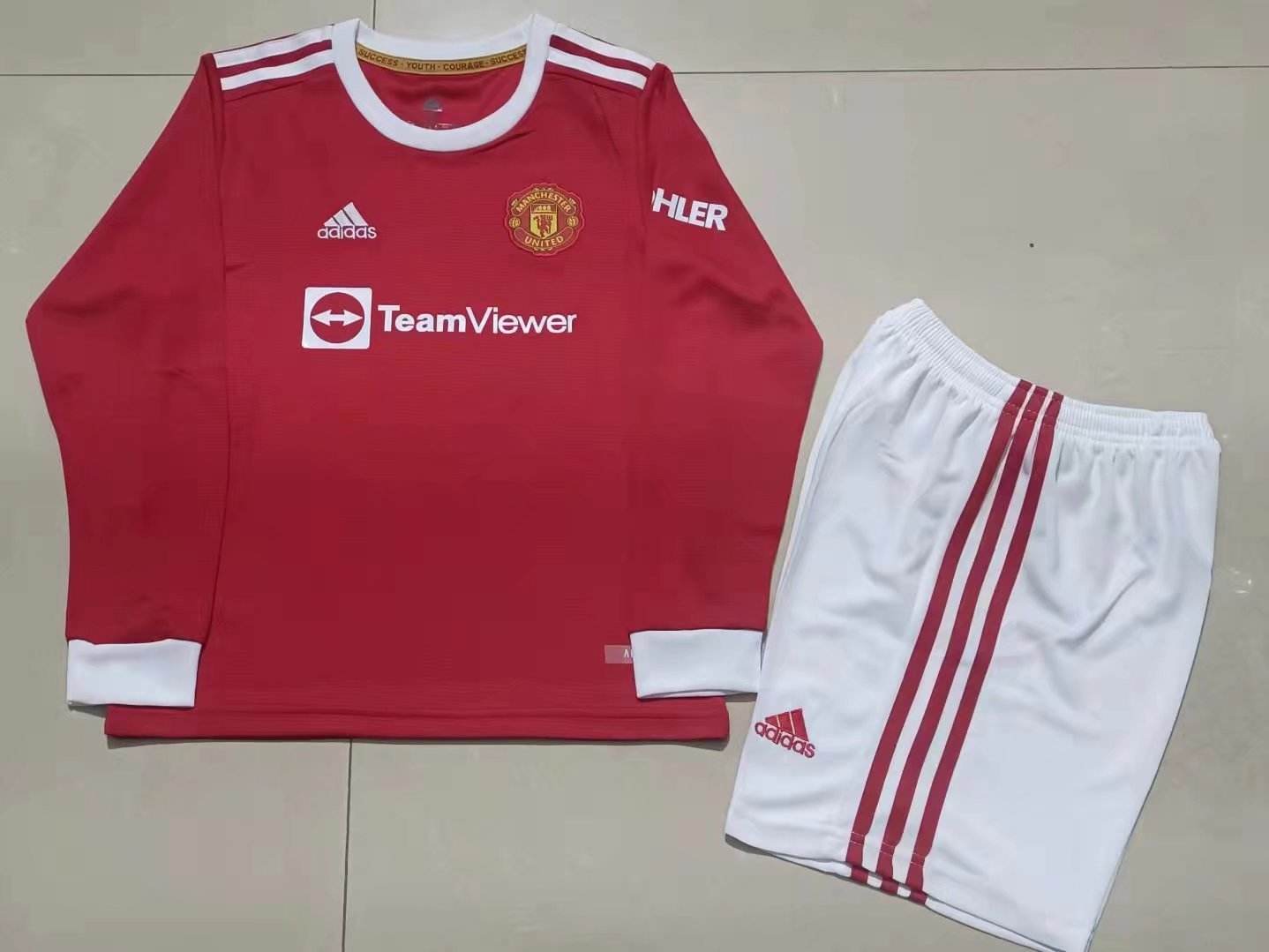 Ensemble de football enfant 21-22 MNU — Domicile · Manches longues