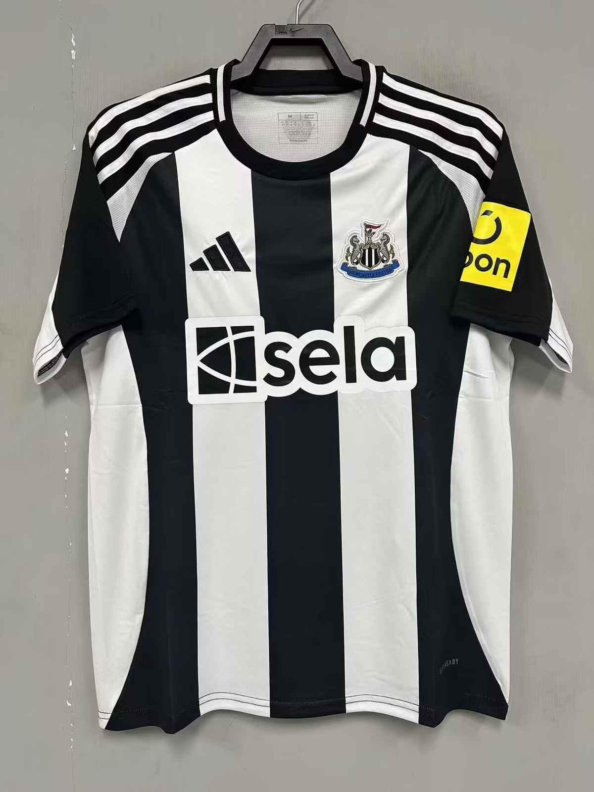 24-25 Newcastle home soccer jersey